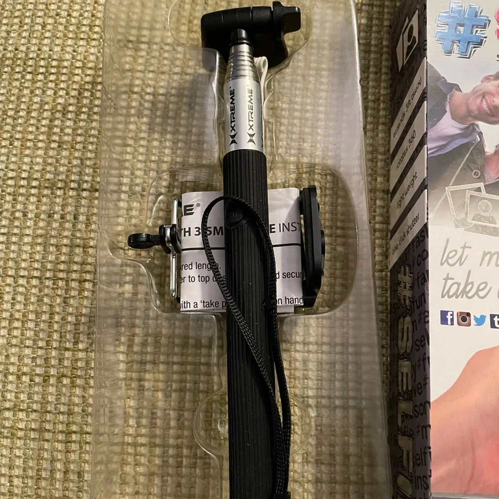 Black Selfie Stick with Built-in Shutter. For use with all smartphones